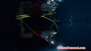 xsiteability.com - Carissa's Christmas night scuba in the pool with colored lights thumbnail